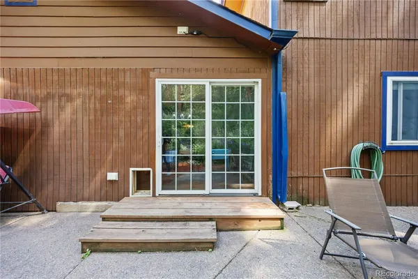 a view of roof deck with patio