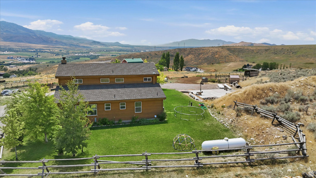 715 Ranch Loop Road Preston, ID 83263 - Photo 54 of 77 Two-story home with wood siding and a brown shingle roof