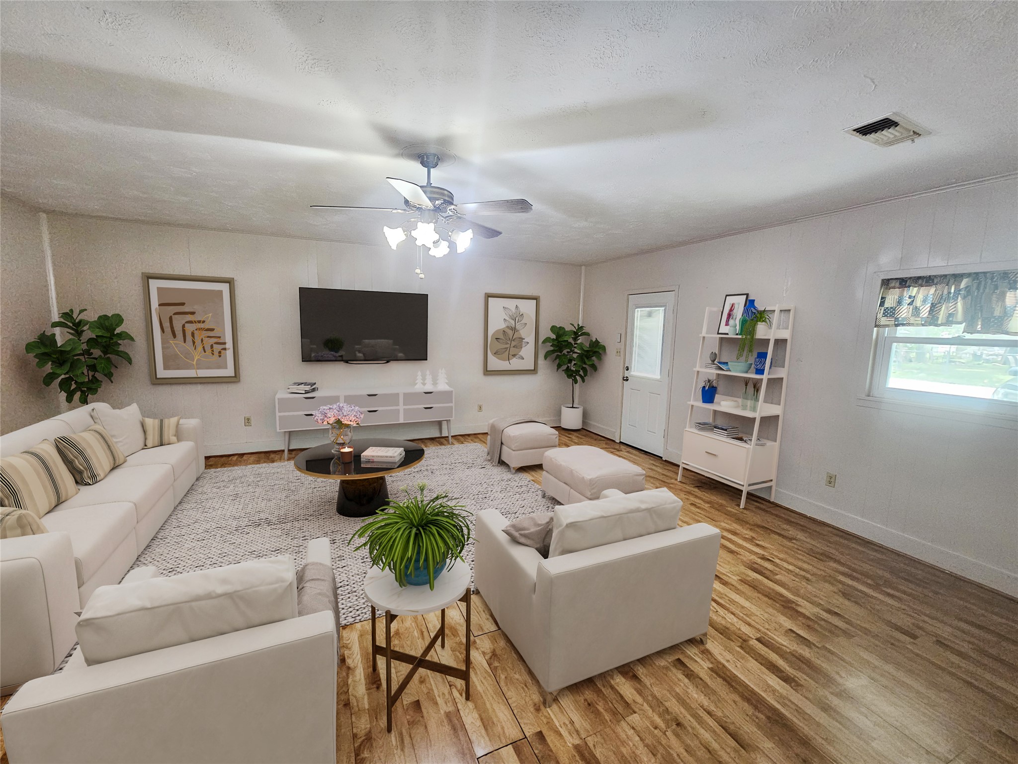 1802 Junker Street Rosenberg, TX 77471 - Photo 7 of 13 a living room with furniture and a flat screen tv