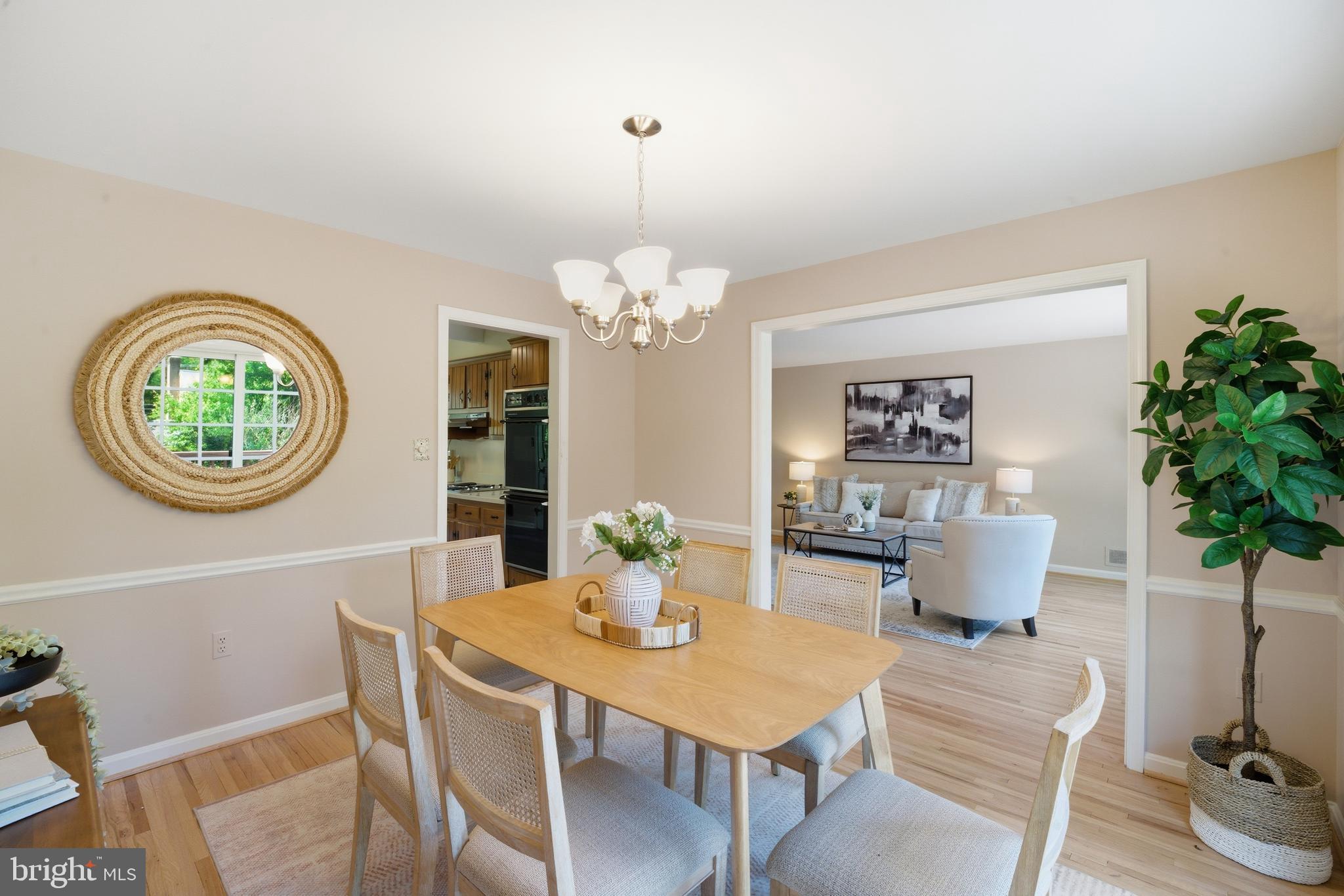 13309 Old Forge Road Silver Spring, MD 20904 - Photo 11 of 52 a view of a dining room with furniture and chandelier