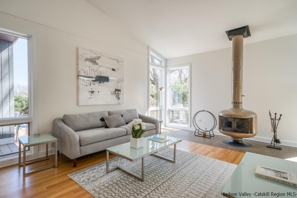 373 Red Top Road Lloyd, NY 12528 - Photo 11 of 32 a living room with furniture a couch and wooden floor