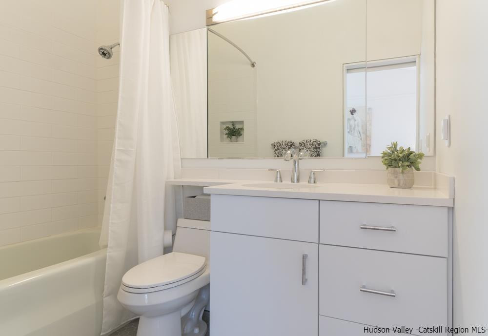 373 Red Top Road Lloyd, NY 12528 - Photo 16 of 32 a bathroom with a sink toilet and shower