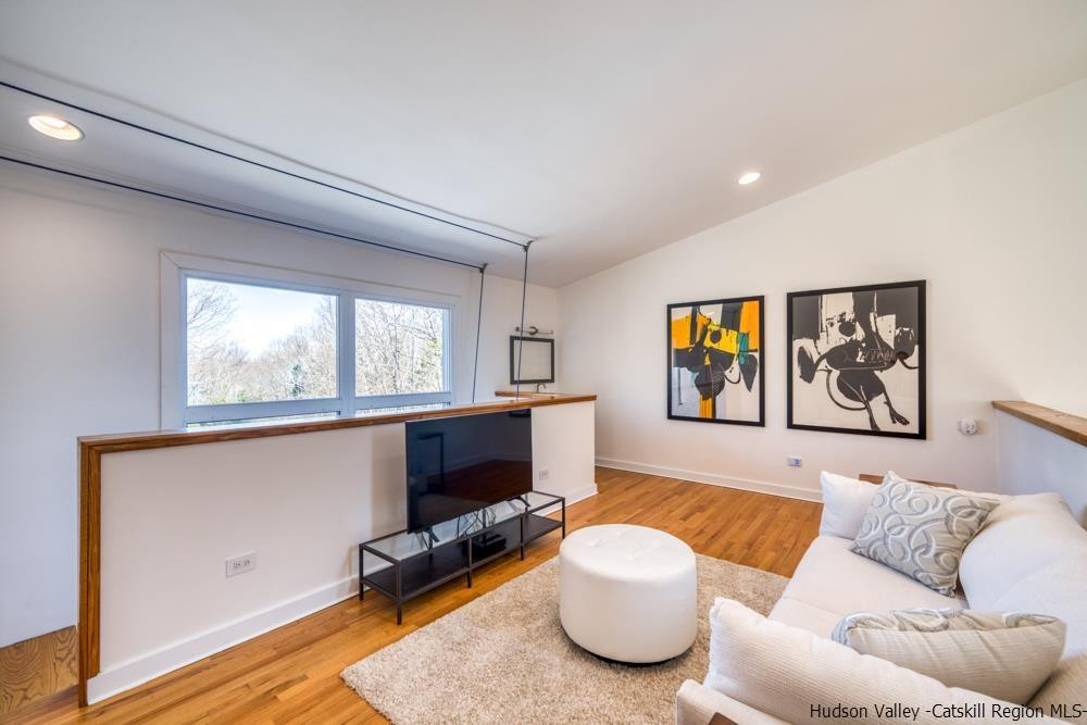 373 Red Top Road Lloyd, NY 12528 - Photo 20 of 32 a living room with furniture and a window
