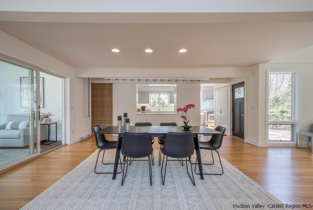 373 Red Top Road Lloyd, NY 12528 - Photo 5 of 32 a view of a a dining room with furniture window and wooden floor