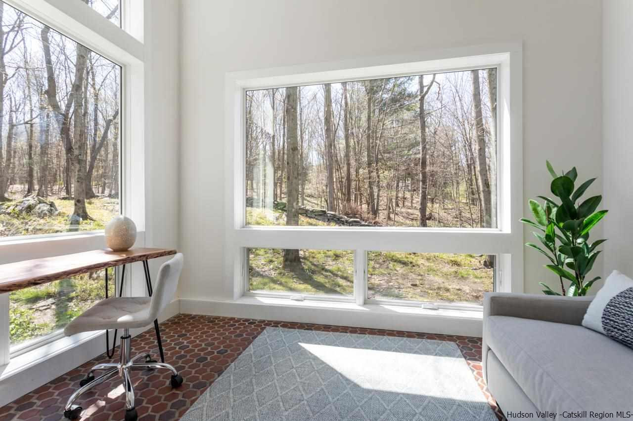 373 Red Top Road Lloyd, NY 12528 - Photo 7 of 32 a living room with furniture and a large window