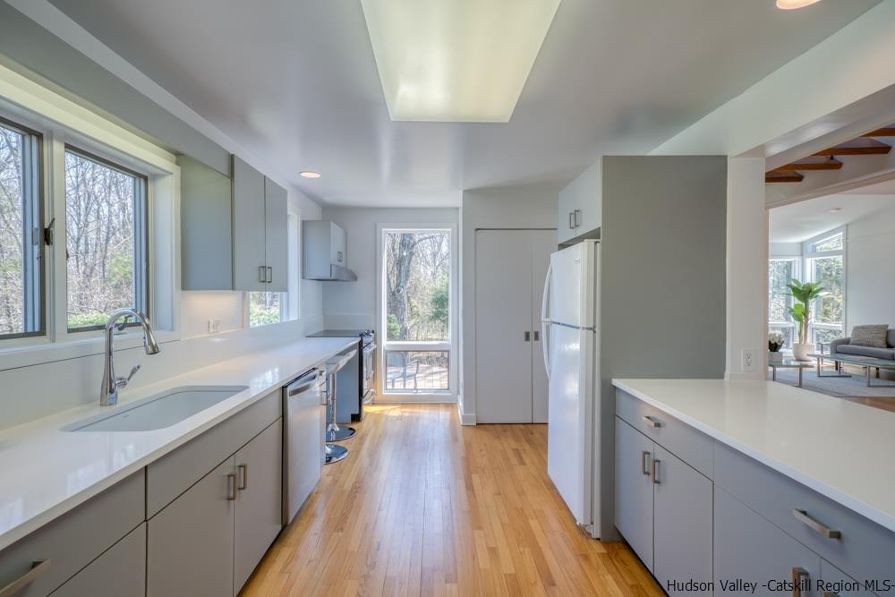 373 Red Top Road Lloyd, NY 12528 - Photo 8 of 32 a large kitchen with a lot of counter space and wooden floor
