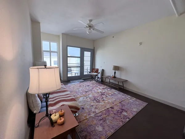 a bed room with a bed and a window