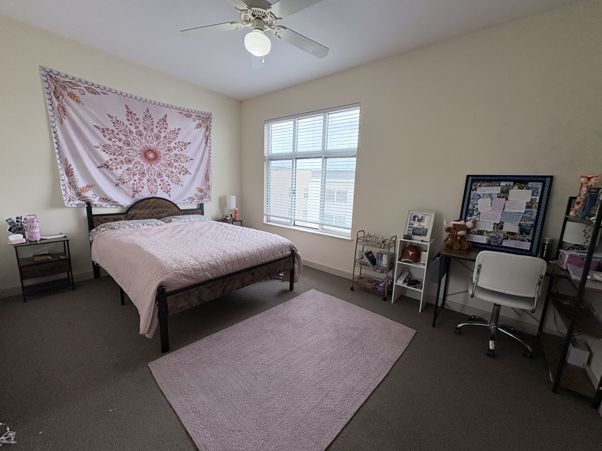 711 West 26th Street, Unit 700 Austin, TX 78705 - Photo 11 of 20 a bedroom with a bed a table and chair