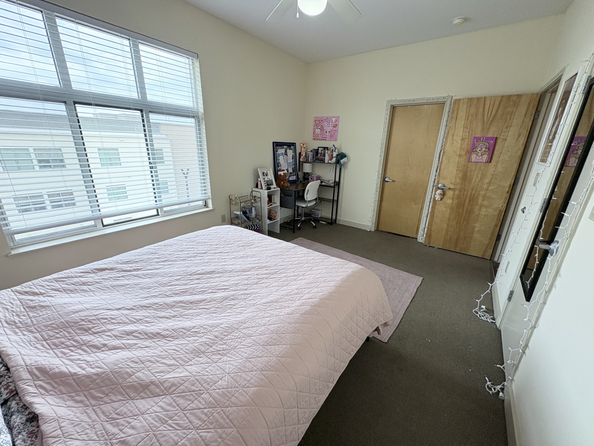 711 West 26th Street, Unit 700 Austin, TX 78705 - Photo 12 of 20 a bed sitting in a bedroom next to a window