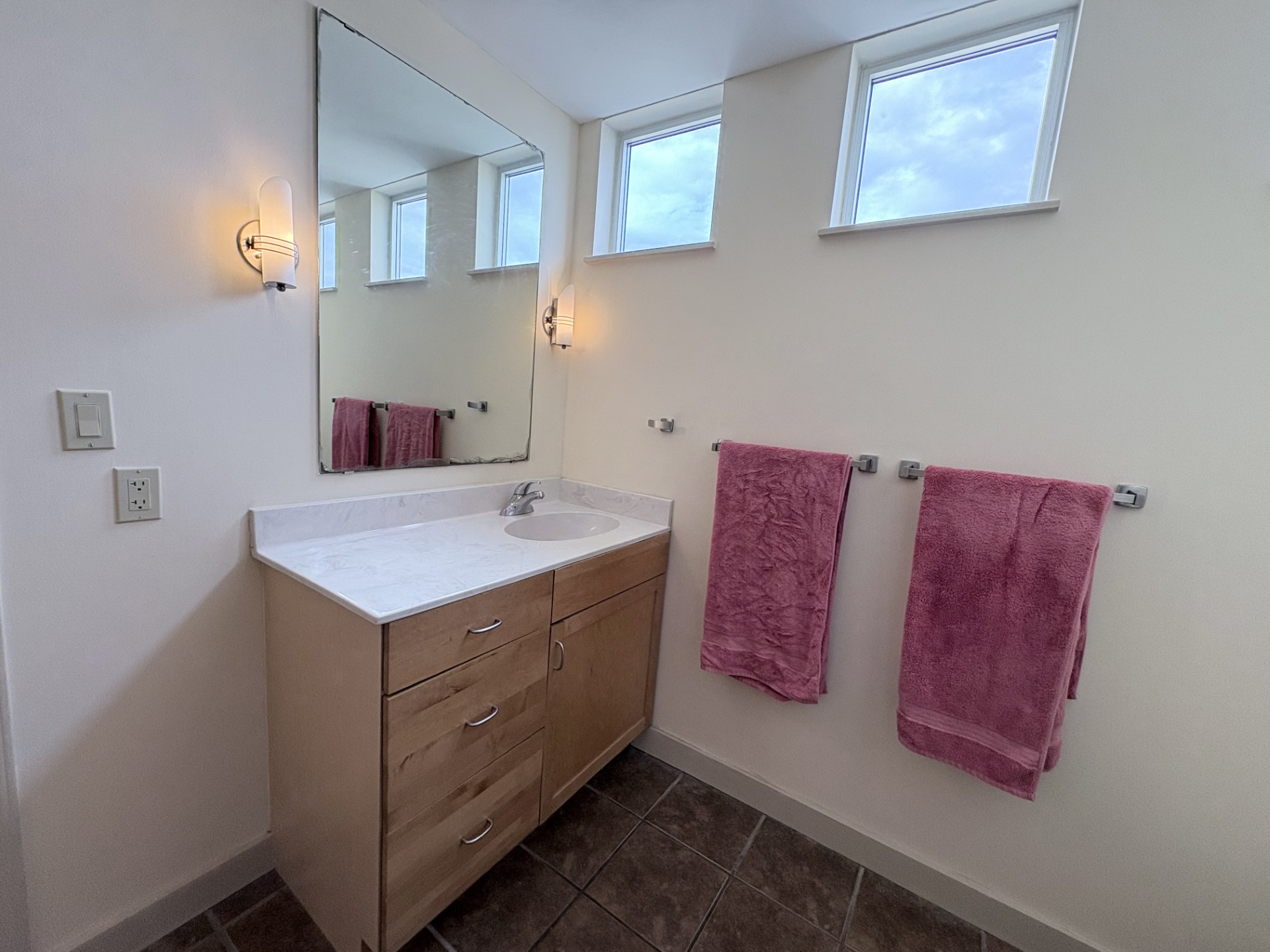 711 West 26th Street, Unit 700 Austin, TX 78705 - Photo 14 of 20 a bathroom with a sink and a mirror