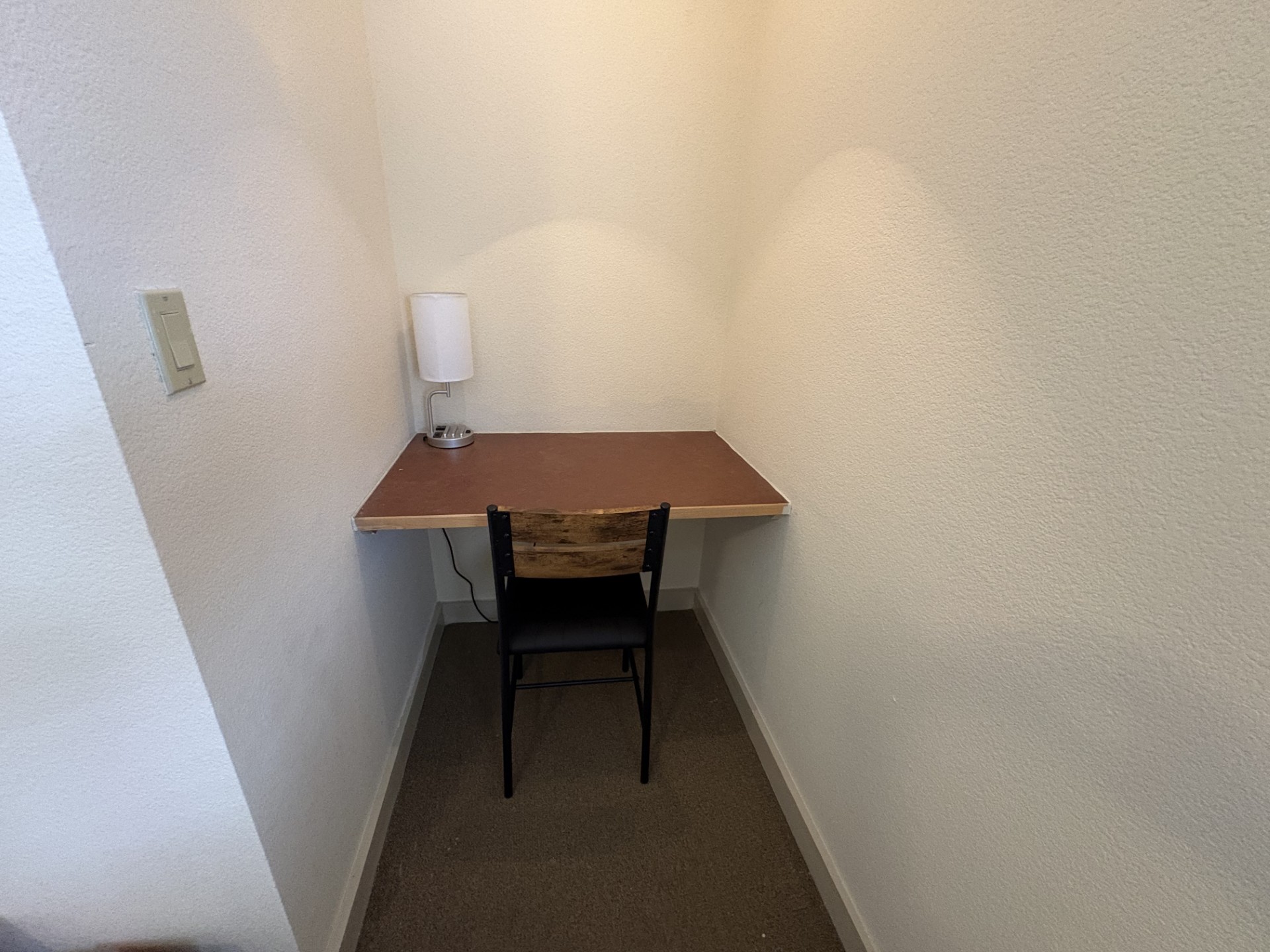 711 West 26th Street, Unit 700 Austin, TX 78705 - Photo 17 of 20 a view of a hallway with a table and chair