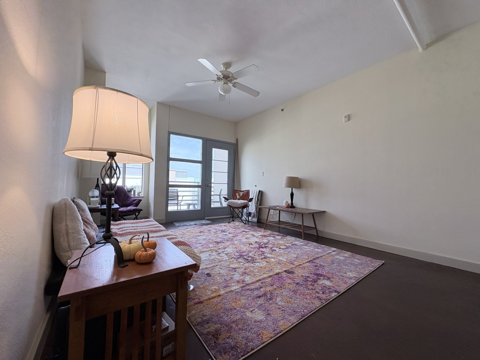 711 West 26th Street, Unit 700 Austin, TX 78705 - Photo 2 of 20 a living room with furniture and a window