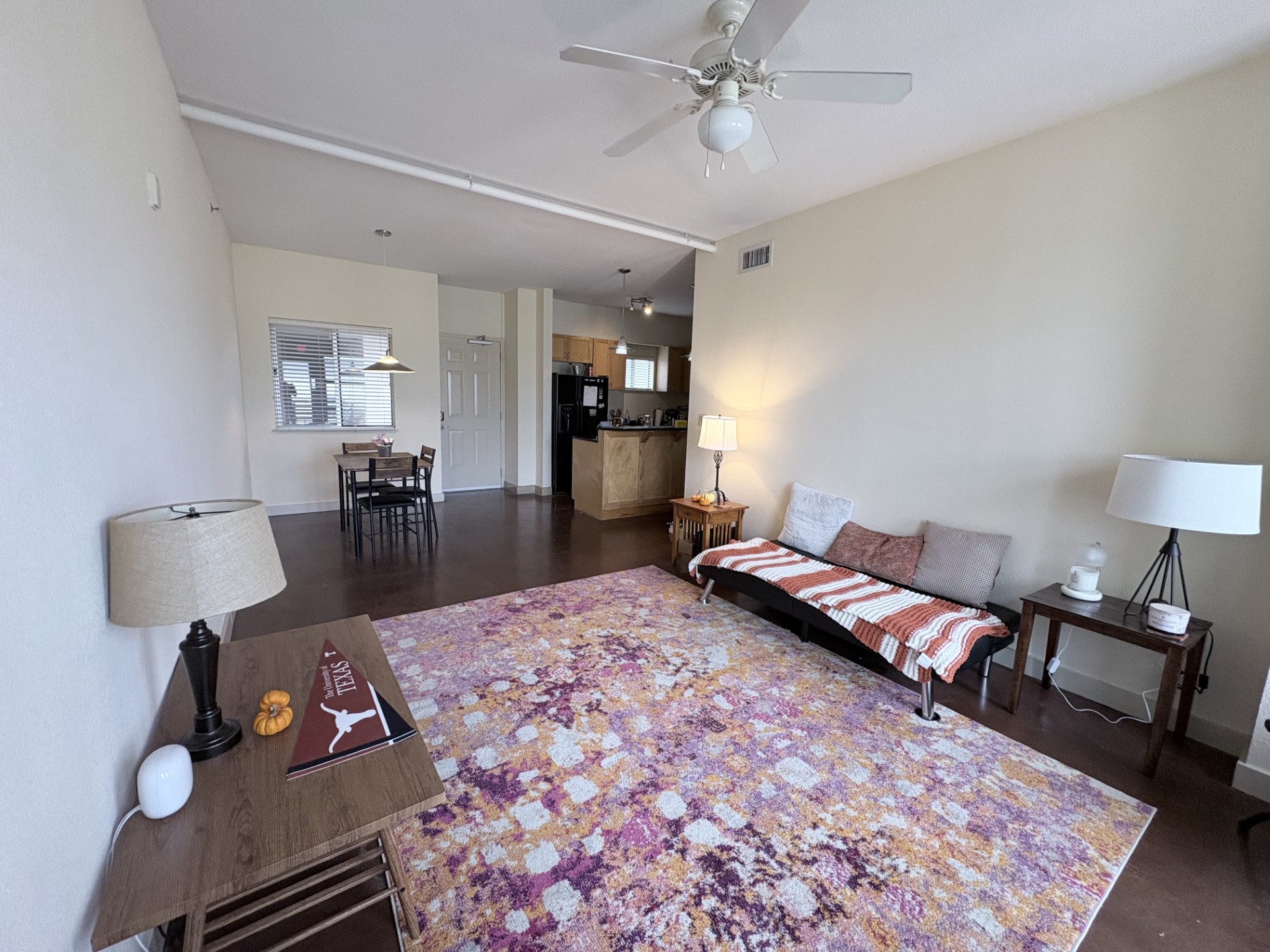 711 West 26th Street, Unit 700 Austin, TX 78705 - Photo 4 of 20 a bed room with a bed furniture and painting on the wall