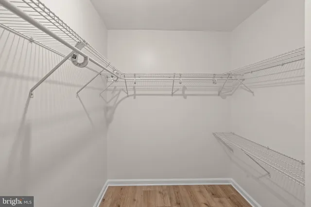 a view of a room with racks on the wall