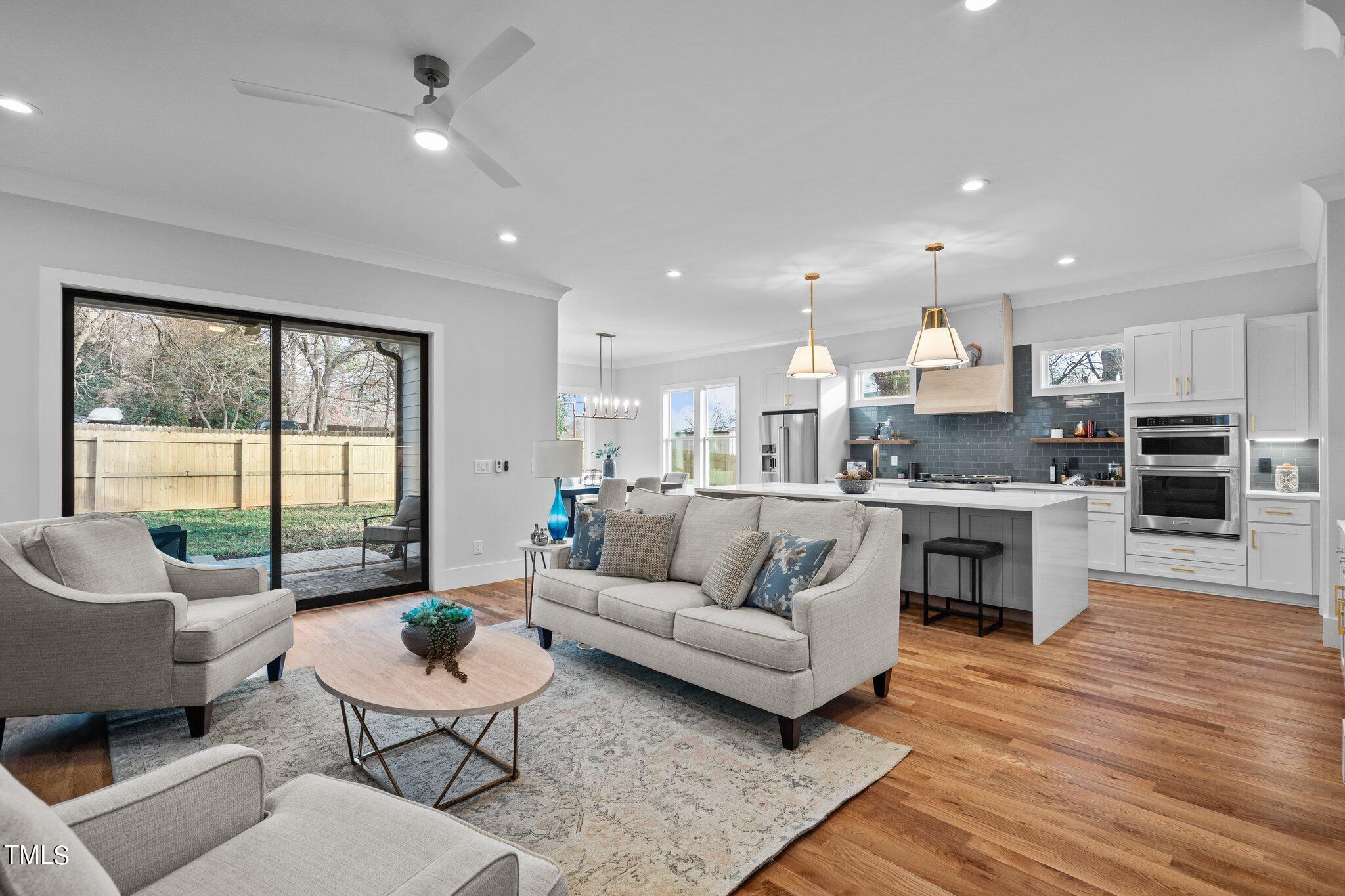 421 Harding Street Raleigh, NC 27604 - Photo 17 of 50 a living room with furniture and a large window