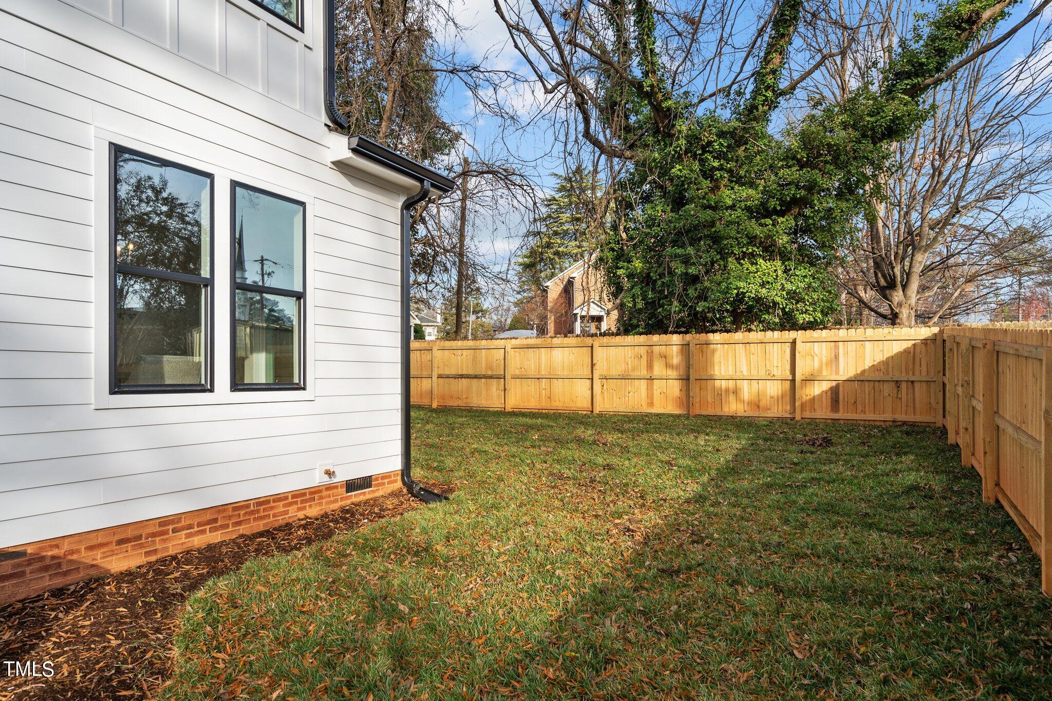 421 Harding Street Raleigh, NC 27604 - Photo 41 of 50 a view of a backyard of the house