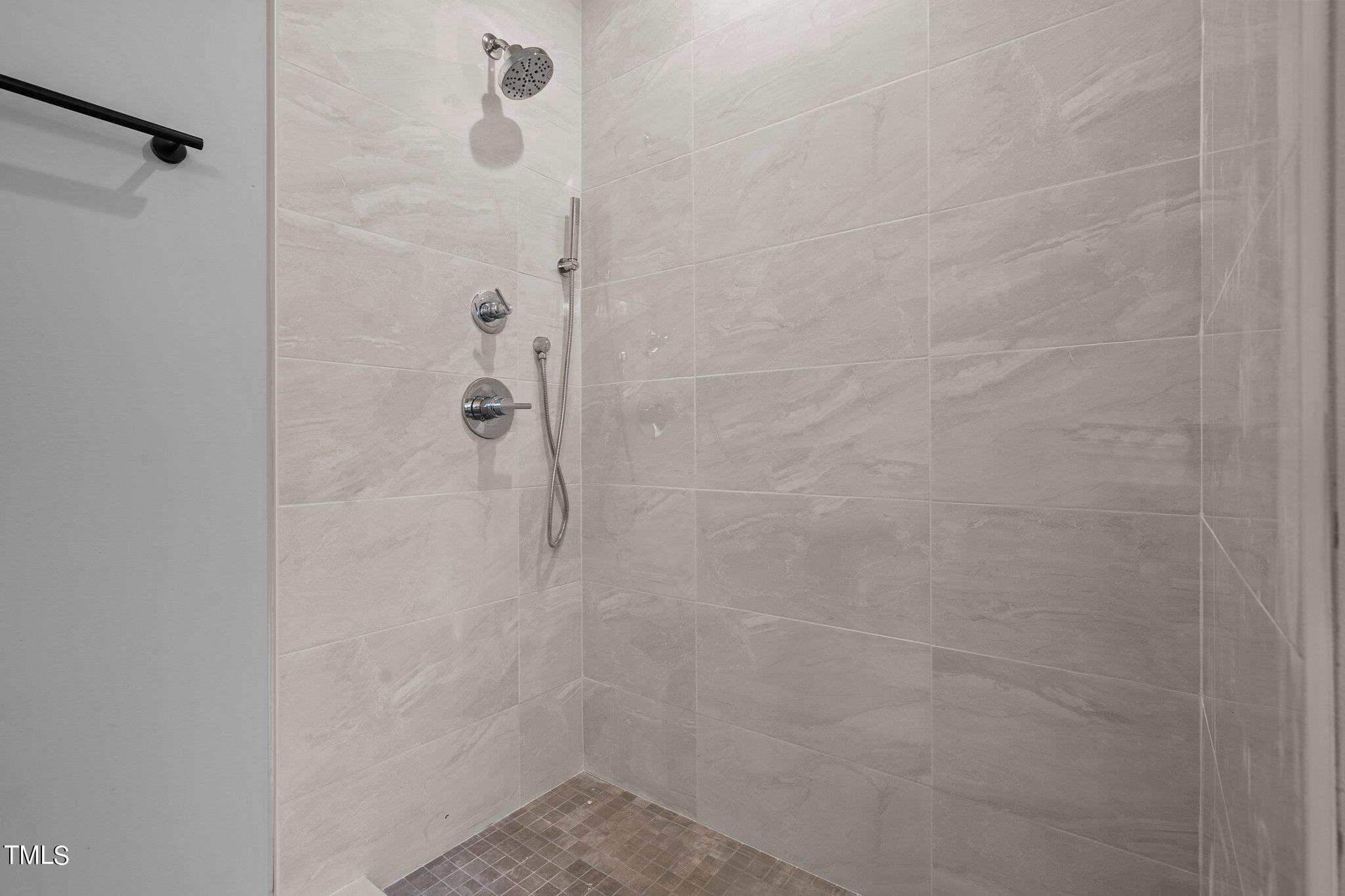 421 Harding Street Raleigh, NC 27604 - Photo 9 of 50 a bathroom with a shower