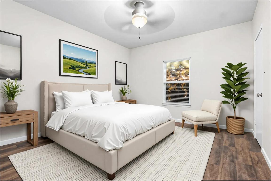 4711 Spicewood Springs Road, Unit 166 Austin, TX 78759 - Photo 13 of 25 a bedroom with a large bed and a chandelier