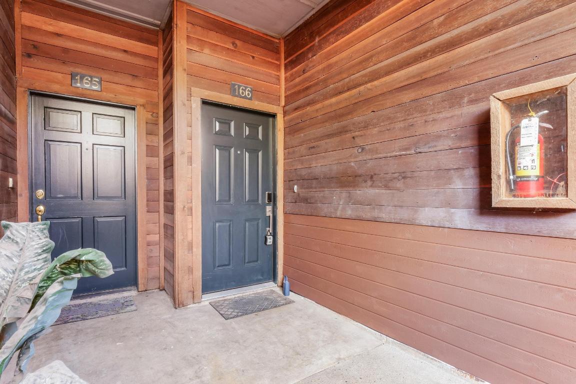 4711 Spicewood Springs Road, Unit 166 Austin, TX 78759 - Photo 2 of 25 a view of front door of house with window