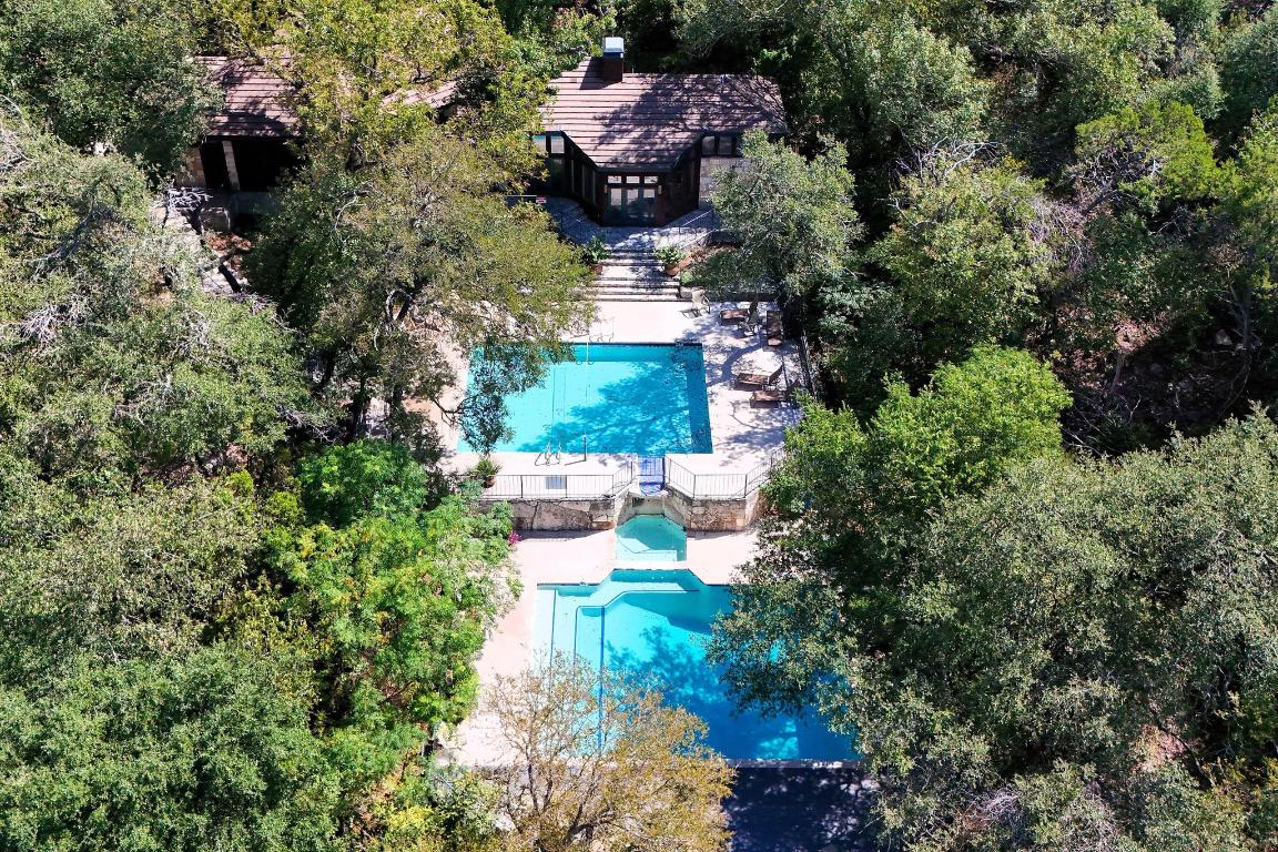 4711 Spicewood Springs Road, Unit 166 Austin, TX 78759 - Photo 23 of 25 an aerial view of a house with yard swimming pool and outdoor seating