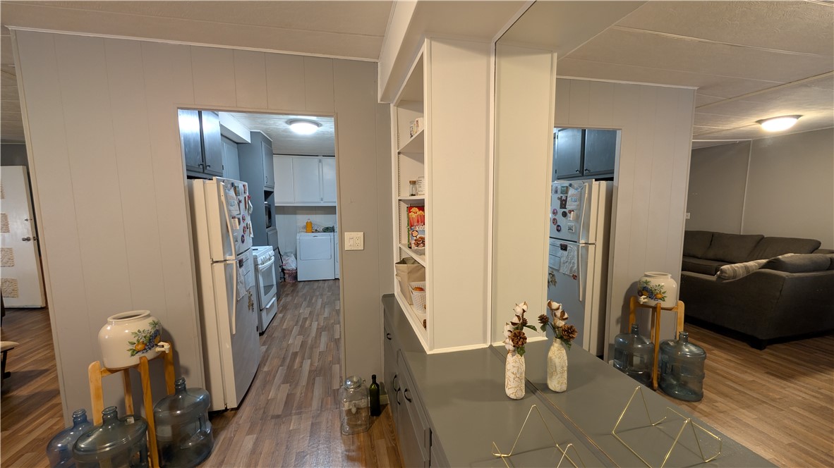 1560 Massachusetts, Unit 96 Riverside, CA 92507 - Photo 8 of 17 a view of a living room and bathroom