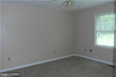 14549 Round Hill Road King George, VA 22485 - Photo 12 of 15 a room that has a window in it