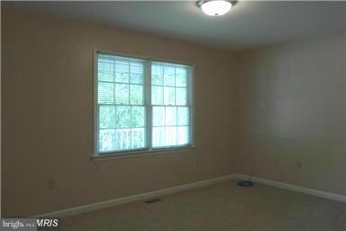 14549 Round Hill Road King George, VA 22485 - Photo 14 of 15 an empty room with a window