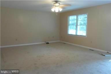 14549 Round Hill Road King George, VA 22485 - Photo 7 of 15 an empty room with a window