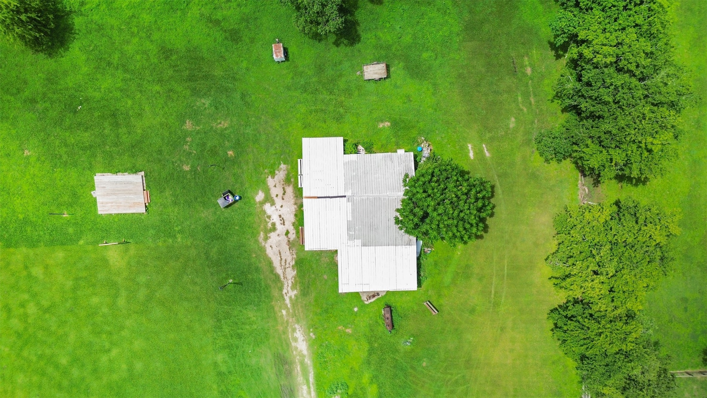 1126 Brooks Avenue Rosenberg, TX 77471 - Photo 6 of 15 an aerial view of a house with a yard