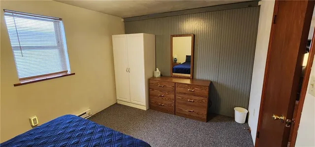 a view of room with window and bathroom