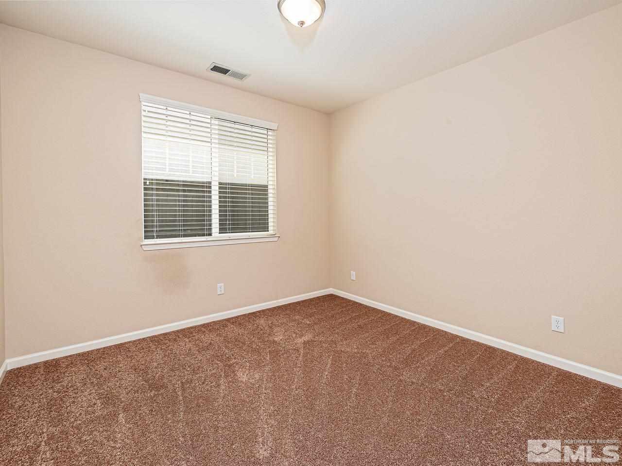 560 Little Sorrel Court Reno, NV 89521 - Photo 12 of 16 an empty room with a window