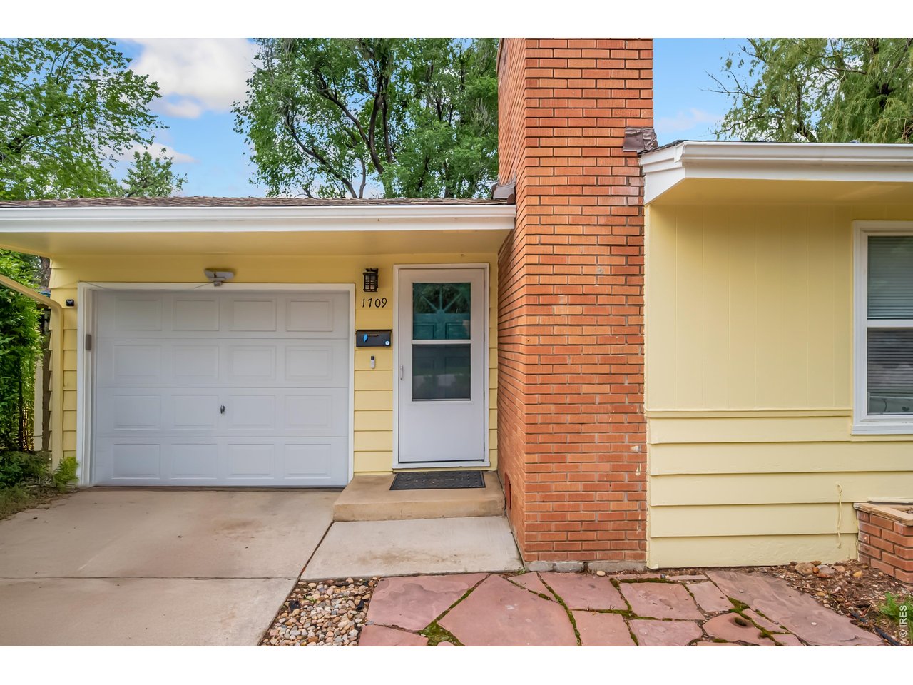 1709 Dale Court Fort Collins, CO 80521 - Photo 4 of 26 a view of entrance gate of a house