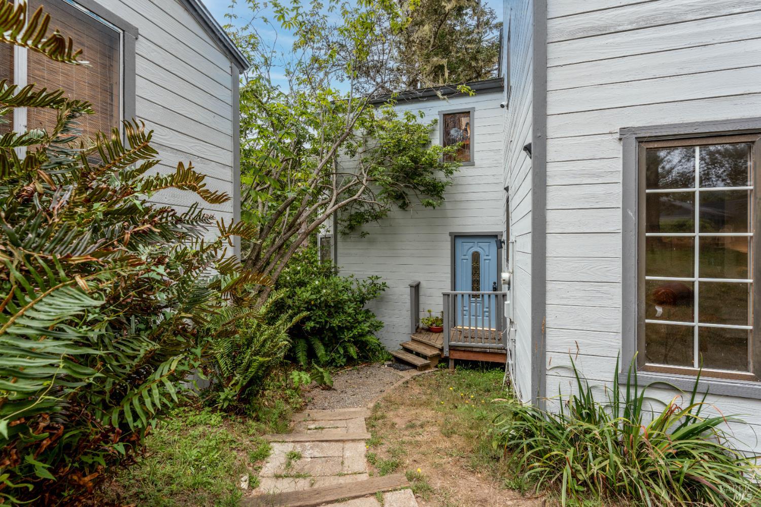 15741 Forest View Road Manchester, CA 95459 - Photo 20 of 28 a house view with a garden space
