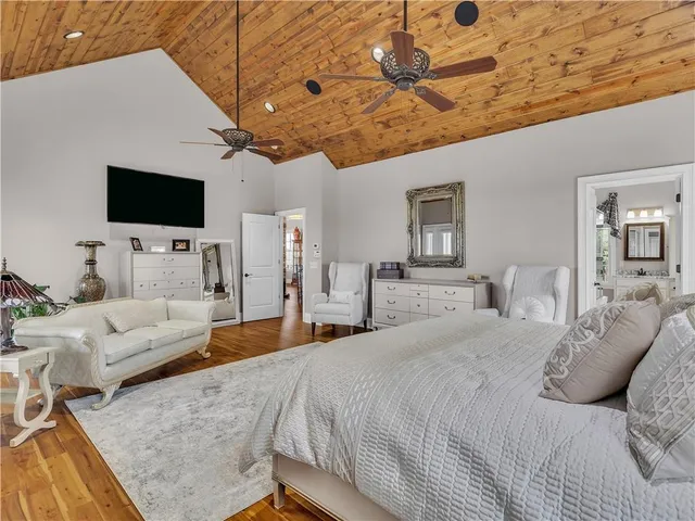 a view of a storage and utility room with washer and dryer