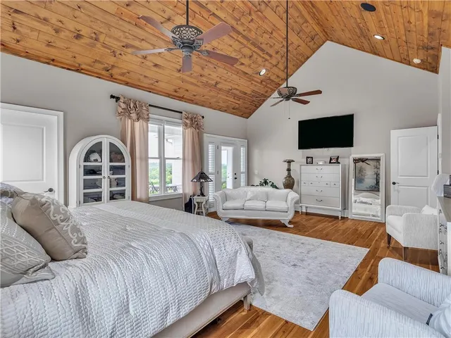 a bedroom with bed and window