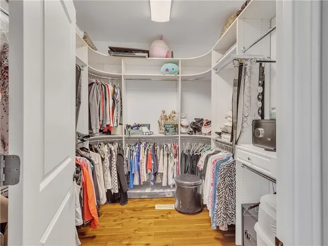 a view of a chairs and table on the wooden floor