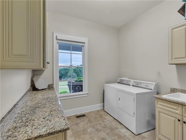 a view of a garden with a building in the background