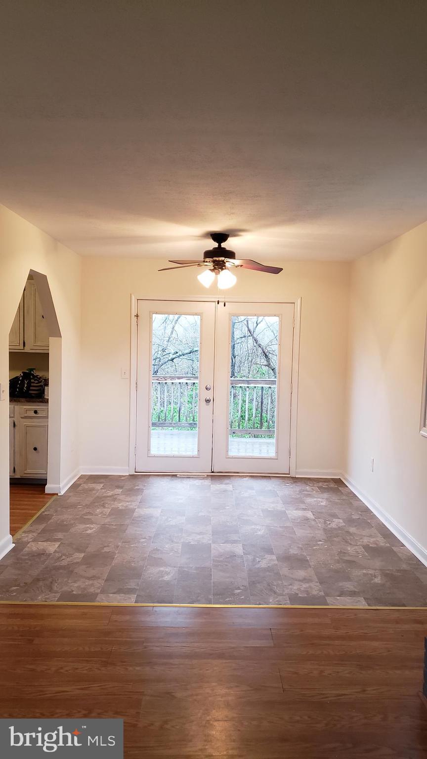 205 Guard Road Middletown, VA 22645 - Photo 11 of 26 a view of an empty room with a window