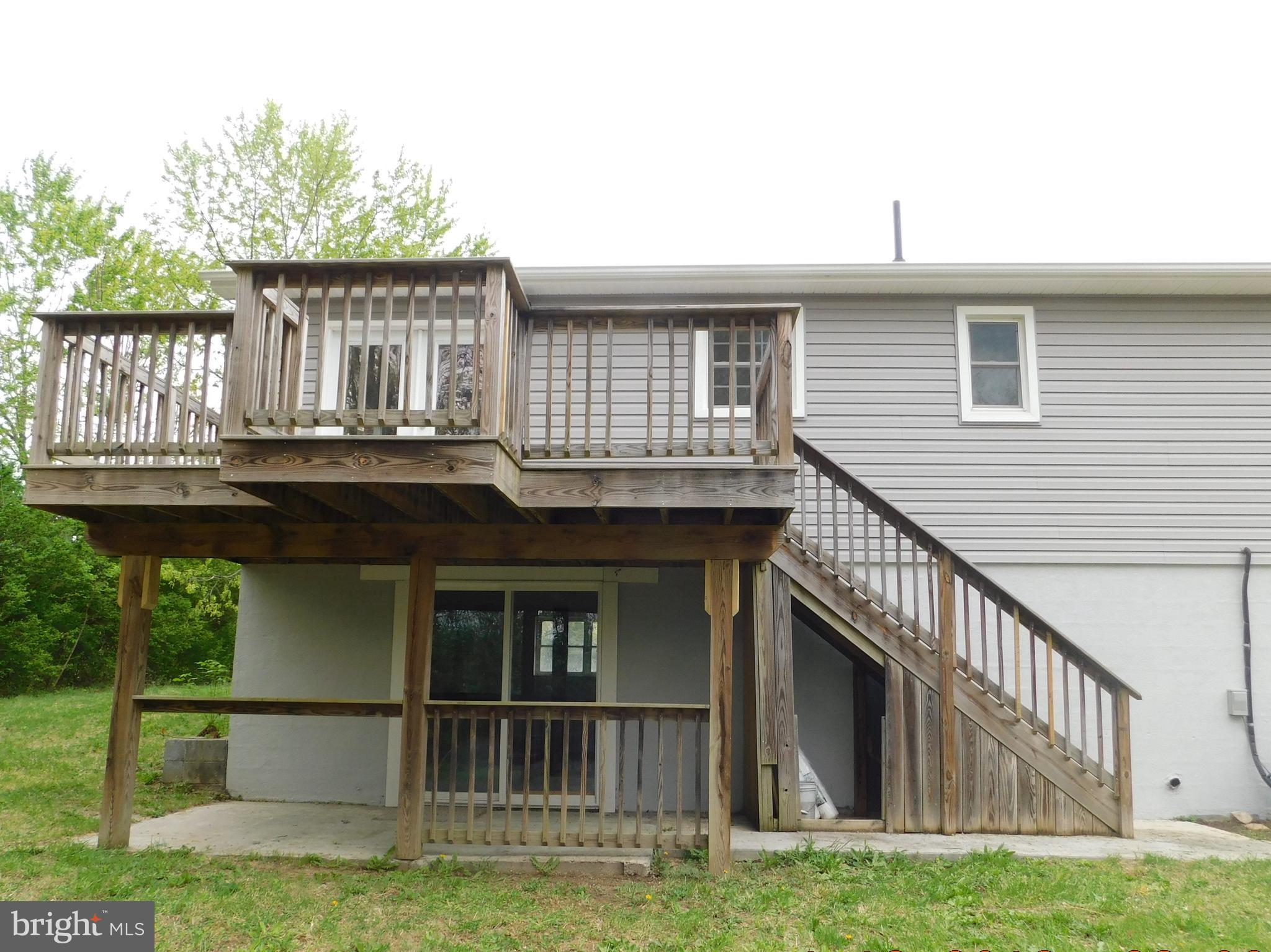 205 Guard Road Middletown, VA 22645 - Photo 24 of 26 a view of a house with a deck