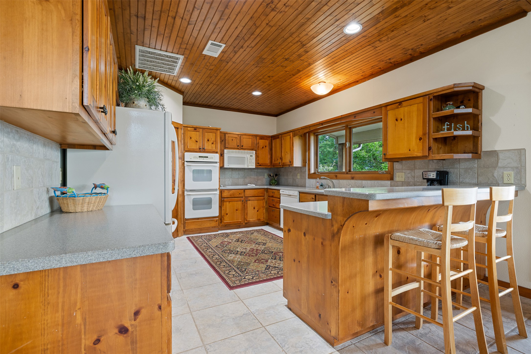 10959 Clyde Acord Road Franklin, TX 77856 - Photo 14 of 39 a very nice looking kitchen with a large window