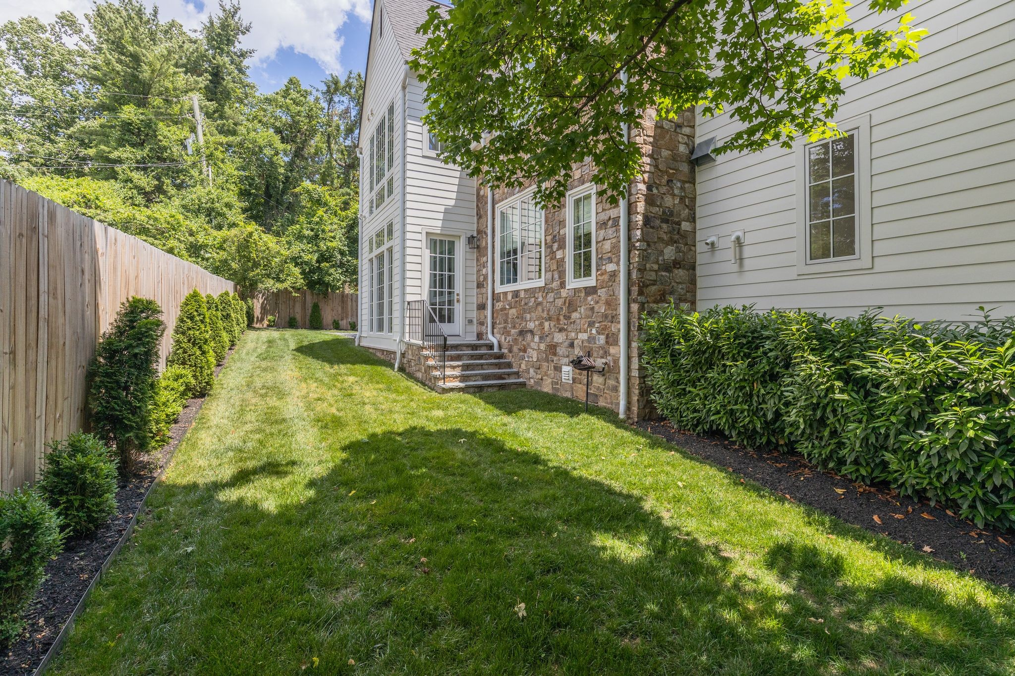 2402 Valley Brook Road Nashville, TN 37215 - Photo 72 of 75 a view of a backyard with plants