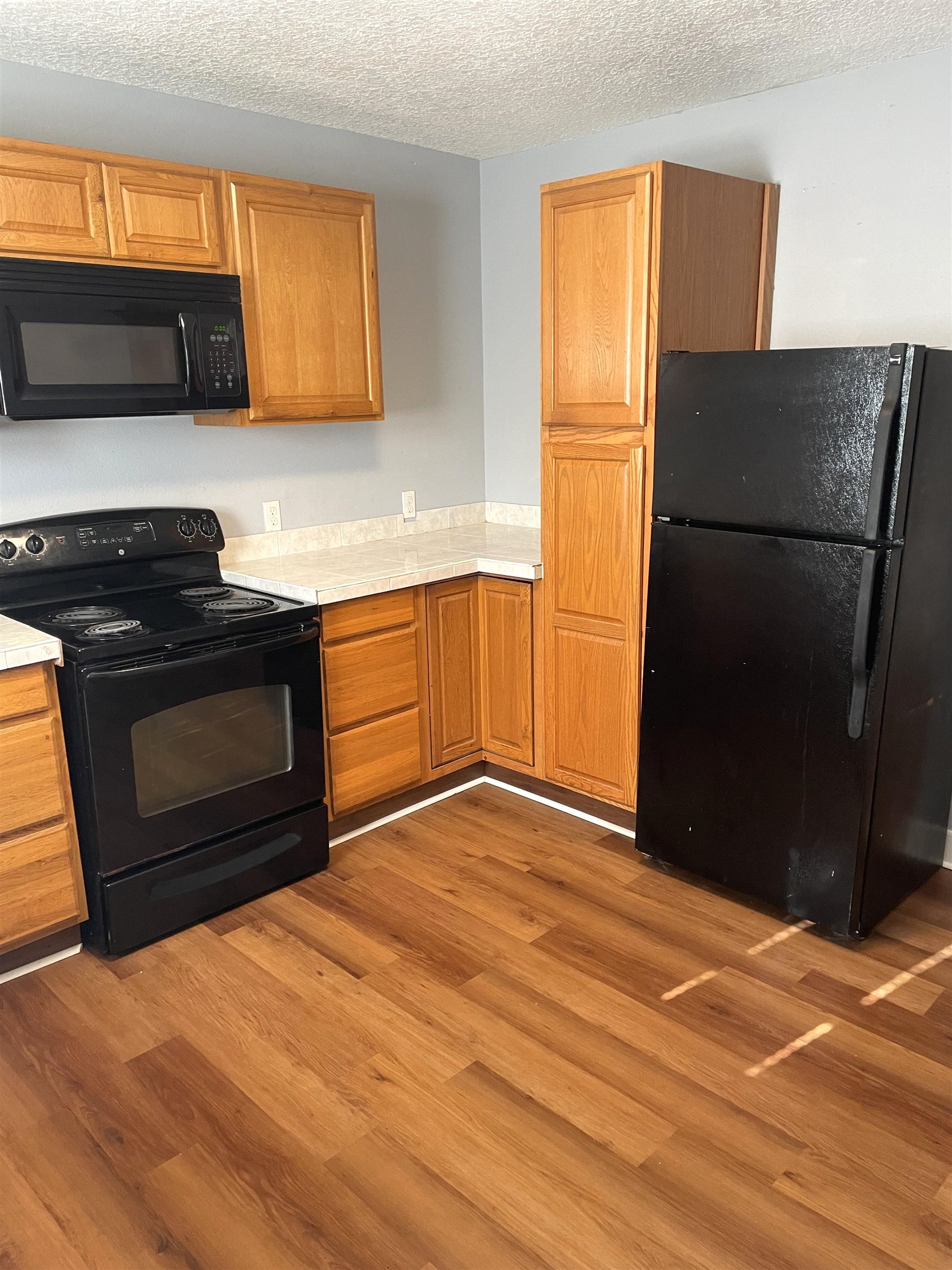 9 Blanche Lane St. Augustine, FL 32084 - Photo 12 of 15 a kitchen with a refrigerator stove and a sink