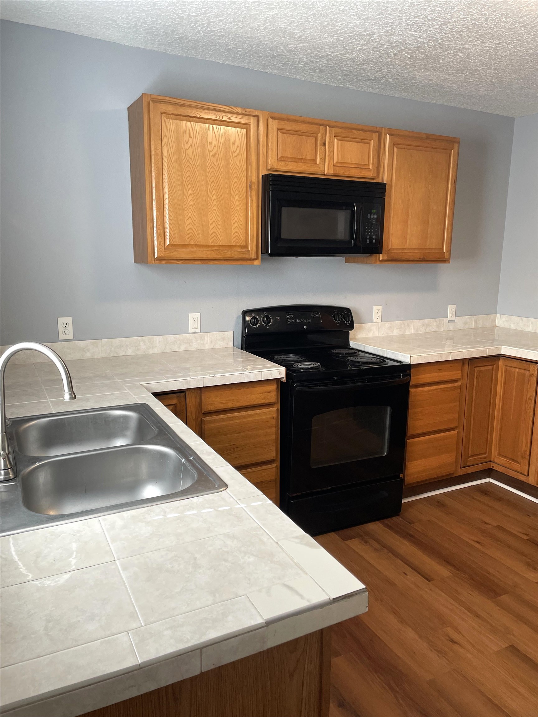 9 Blanche Lane St. Augustine, FL 32084 - Photo 13 of 15 a kitchen with a sink and a stove top oven