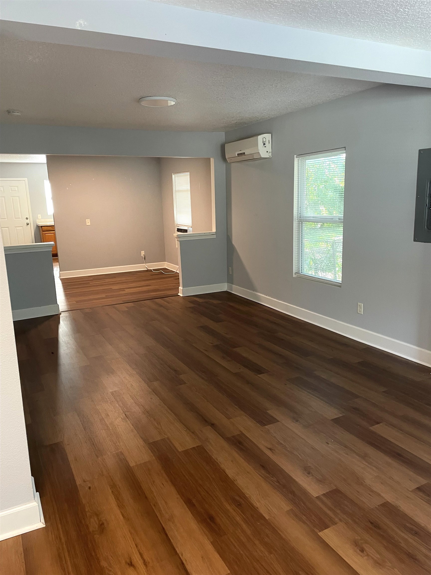 9 Blanche Lane St. Augustine, FL 32084 - Photo 2 of 15 a view of an empty room with wooden floor and a window