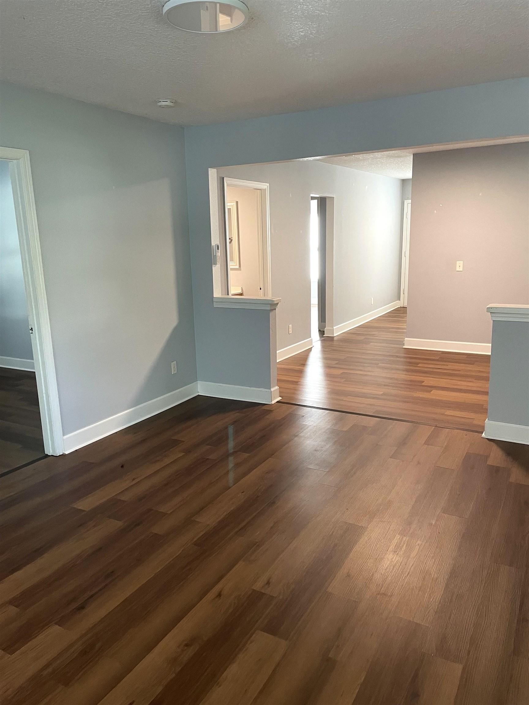 9 Blanche Lane St. Augustine, FL 32084 - Photo 5 of 15 a view of an empty room with wooden floor and a window