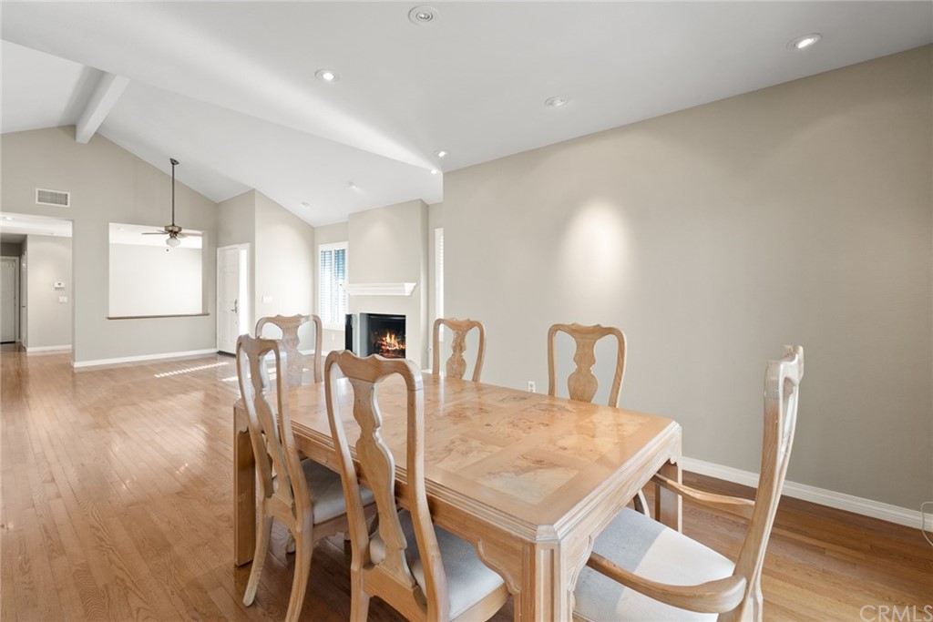5 Elderwood, Unit 19 Irvine, CA 92614 - Photo 11 of 39 a dining room with furniture and wooden floor