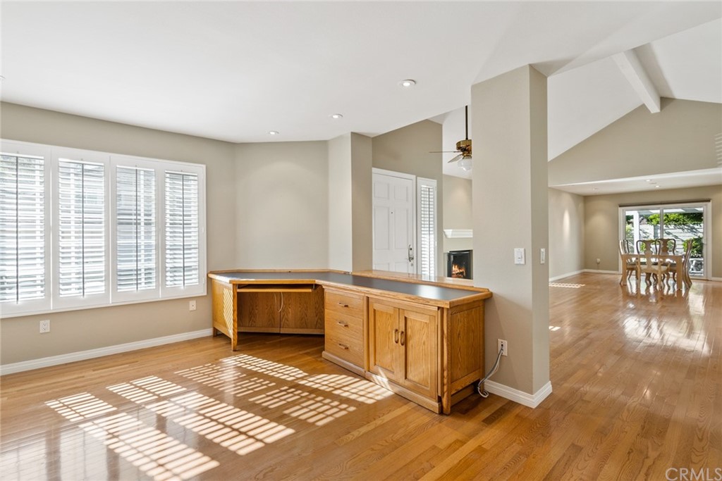 5 Elderwood, Unit 19 Irvine, CA 92614 - Photo 25 of 39 a spacious bedroom with a bed and wooden floor