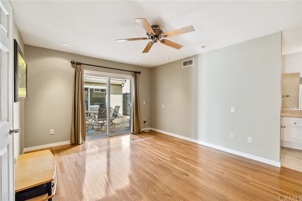 5 Elderwood, Unit 19 Irvine, CA 92614 - Photo 28 of 39 a view of empty room with wooden floor