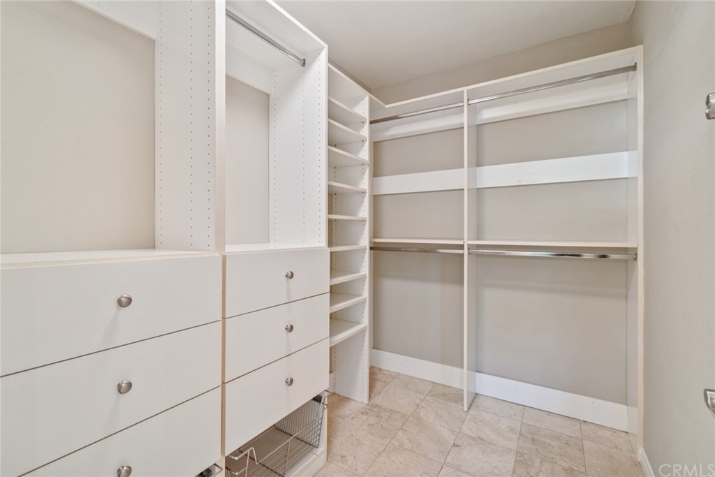 5 Elderwood, Unit 19 Irvine, CA 92614 - Photo 33 of 39 a view of an empty walk in closet