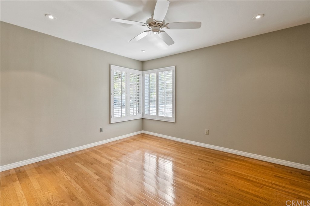 5 Elderwood, Unit 19 Irvine, CA 92614 - Photo 35 of 39 wooden floor in an empty room with a window